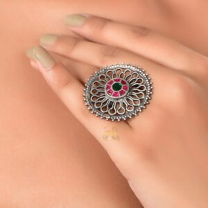 Adjustable silver ring with red and green stone