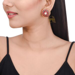 Gold tone silver stud with pink stone